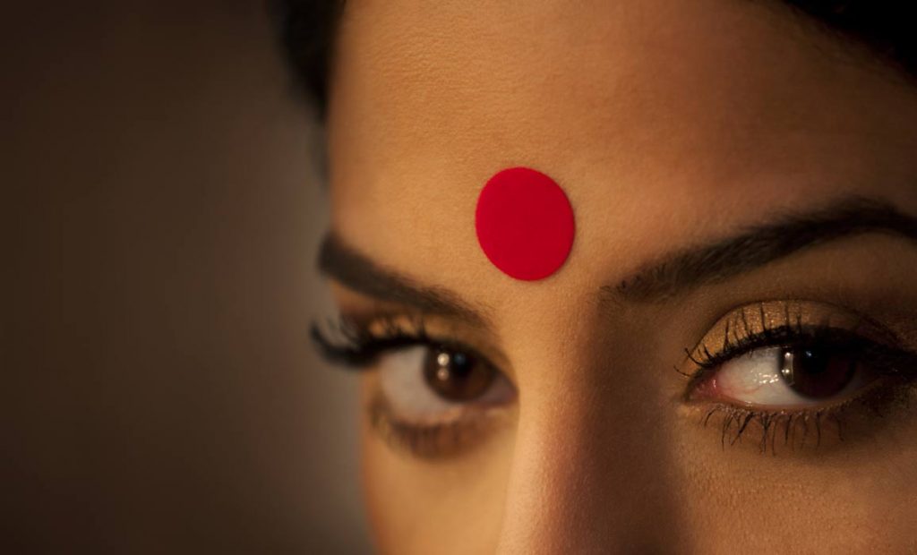 Why Indian Wear Red Dots On Their Forehead